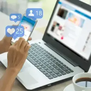 laptop with mobile phone and like symbols