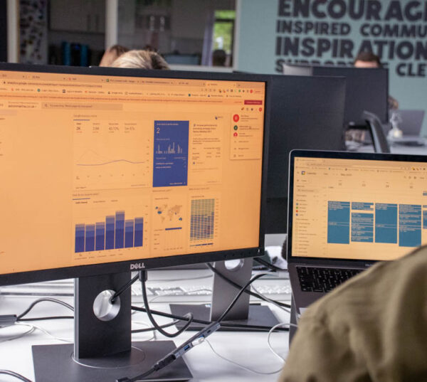extramile hq team member working on google analytics
