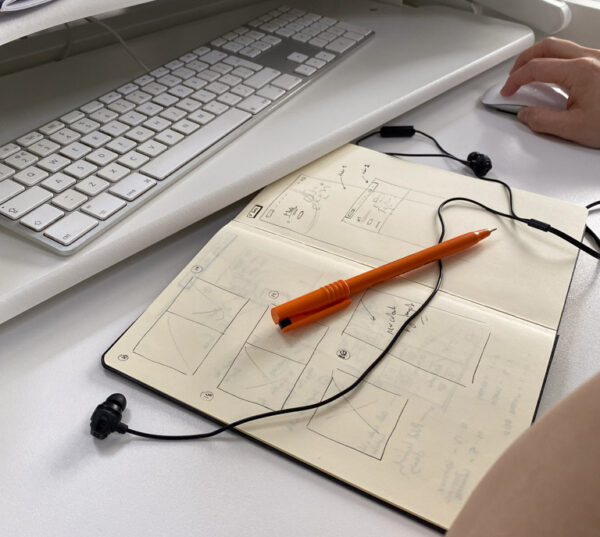 notepad and pen on desk