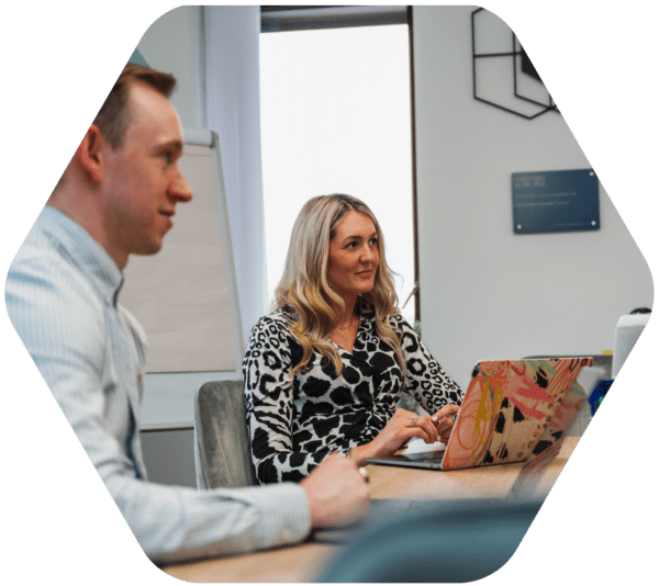 extramile hq team in meeting