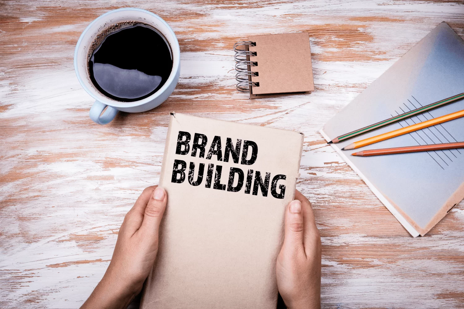 brand building notepad on desk