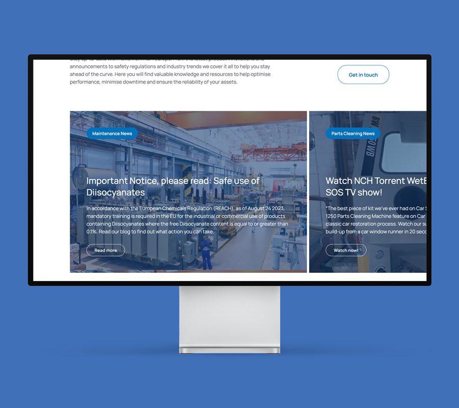 Desktop monitor on a blue background displaying the NCH Europe website