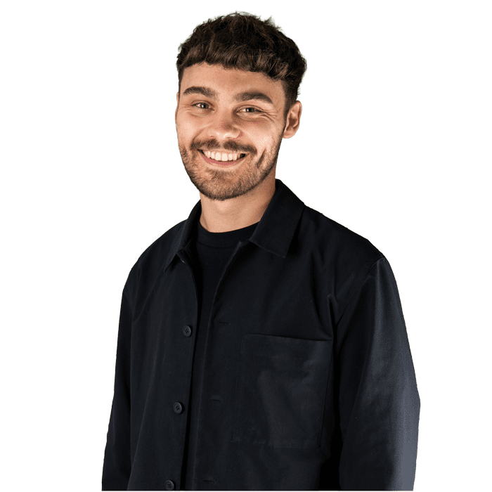 Smiling headshot of Social Media Specialist Luke.