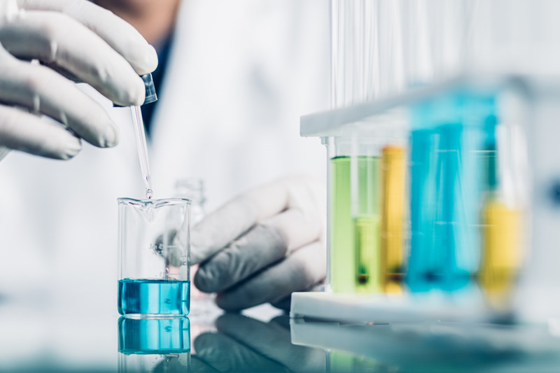 Industrial facility graphic highlighting the chemical and manufacturing sector